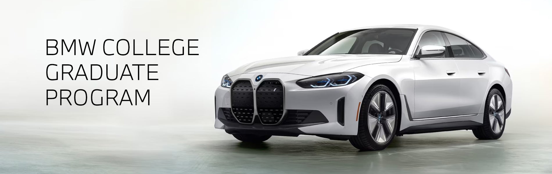 White BMW i4 parked. BMW College Graduate Program. | BMW of Louisville in Louisville KY